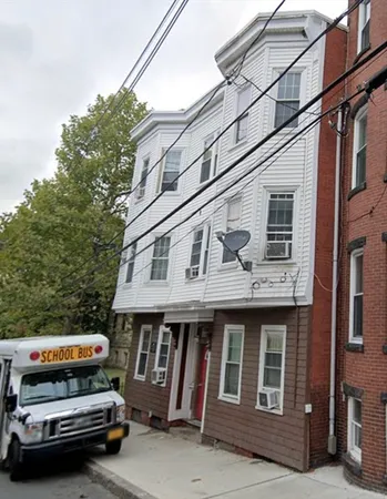 a car parked in front of a building