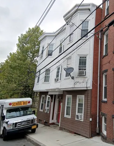 a car parked in front of a building