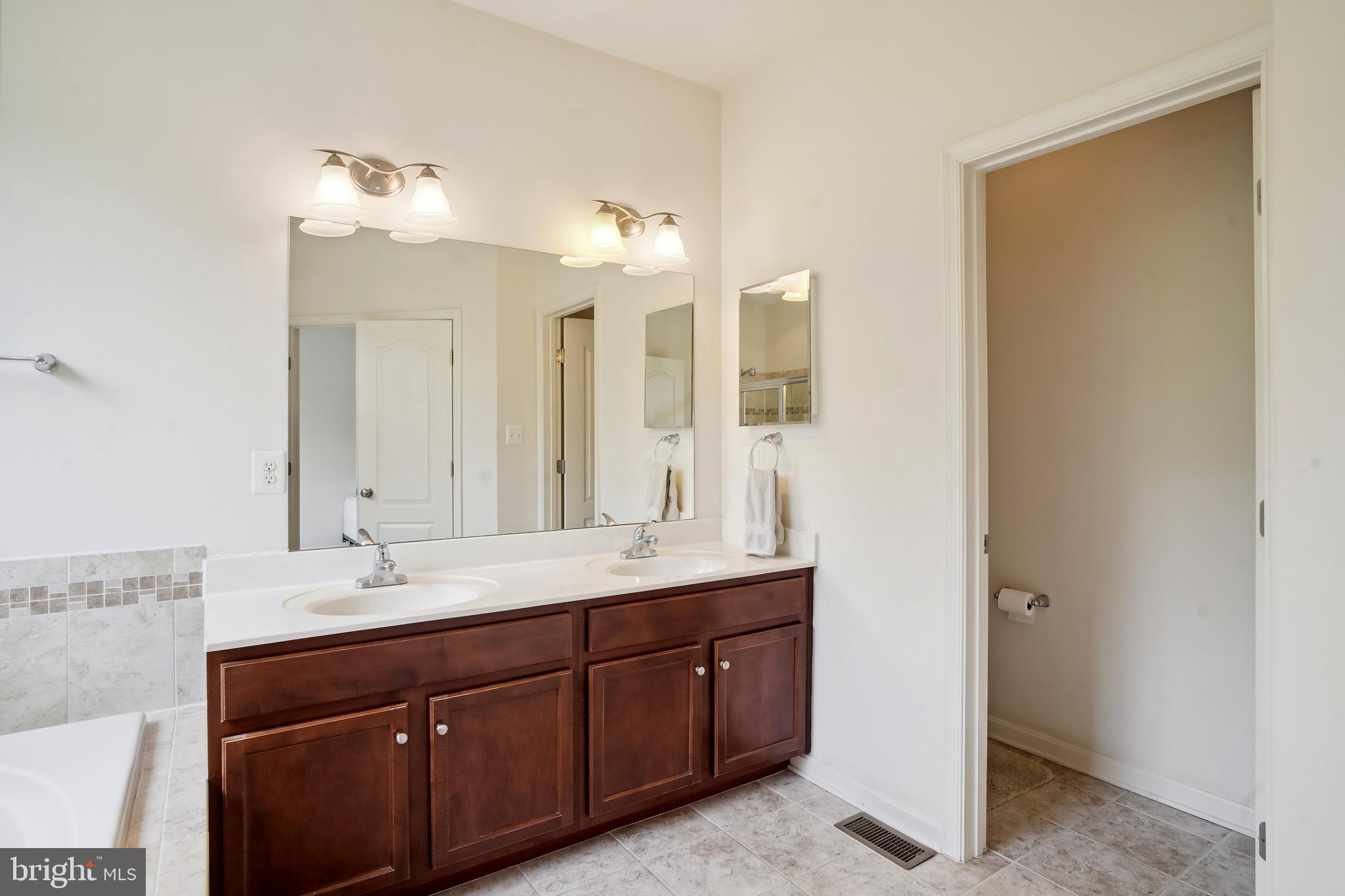 5044 Wesley Square Frederick, MD 21703 - Photo 19 of 46 Master Bathroom with Double Sinks