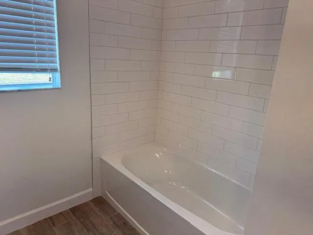 a bathroom with a bathtub