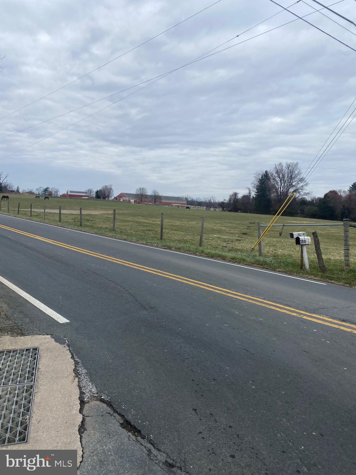 3738 Damascus Road Brookeville, MD 20833 - Photo 6 of 13 a view of a street with a houses