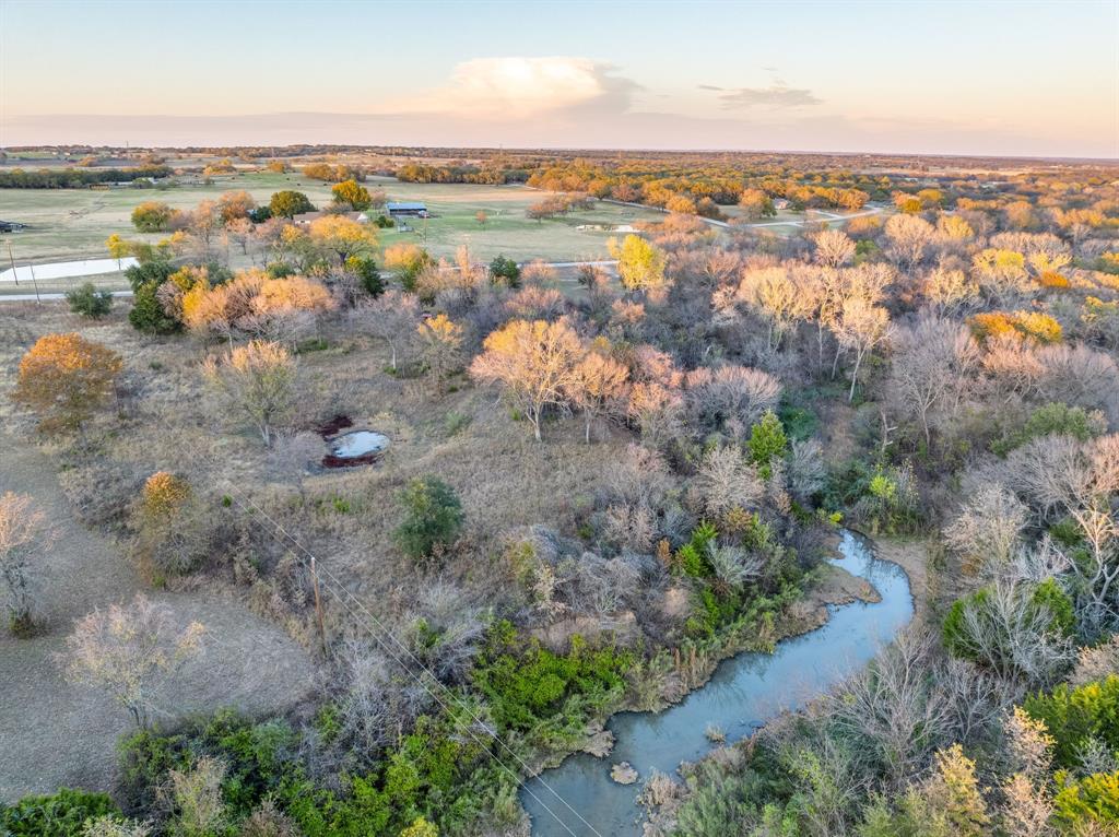 1874 County Road 3676 Springtown, TX 76082 - Photo 11 of 14 an aerial view of multiple house