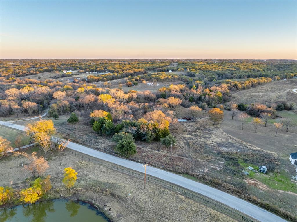 1874 County Road 3676 Springtown, TX 76082 - Photo 9 of 14 an aerial view of multiple house