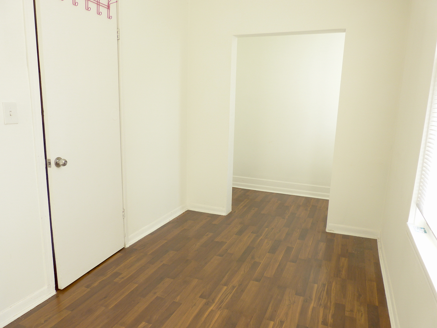 1617 West 38th Place Chicago, IL 60609 - Photo 12 of 18 a view of a small space with wooden floor
