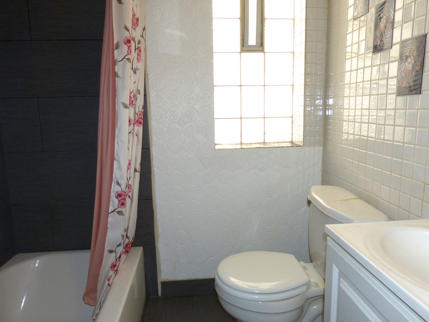 1617 West 38th Place Chicago, IL 60609 - Photo 9 of 18 a bathroom with a toilet and a shower curtain