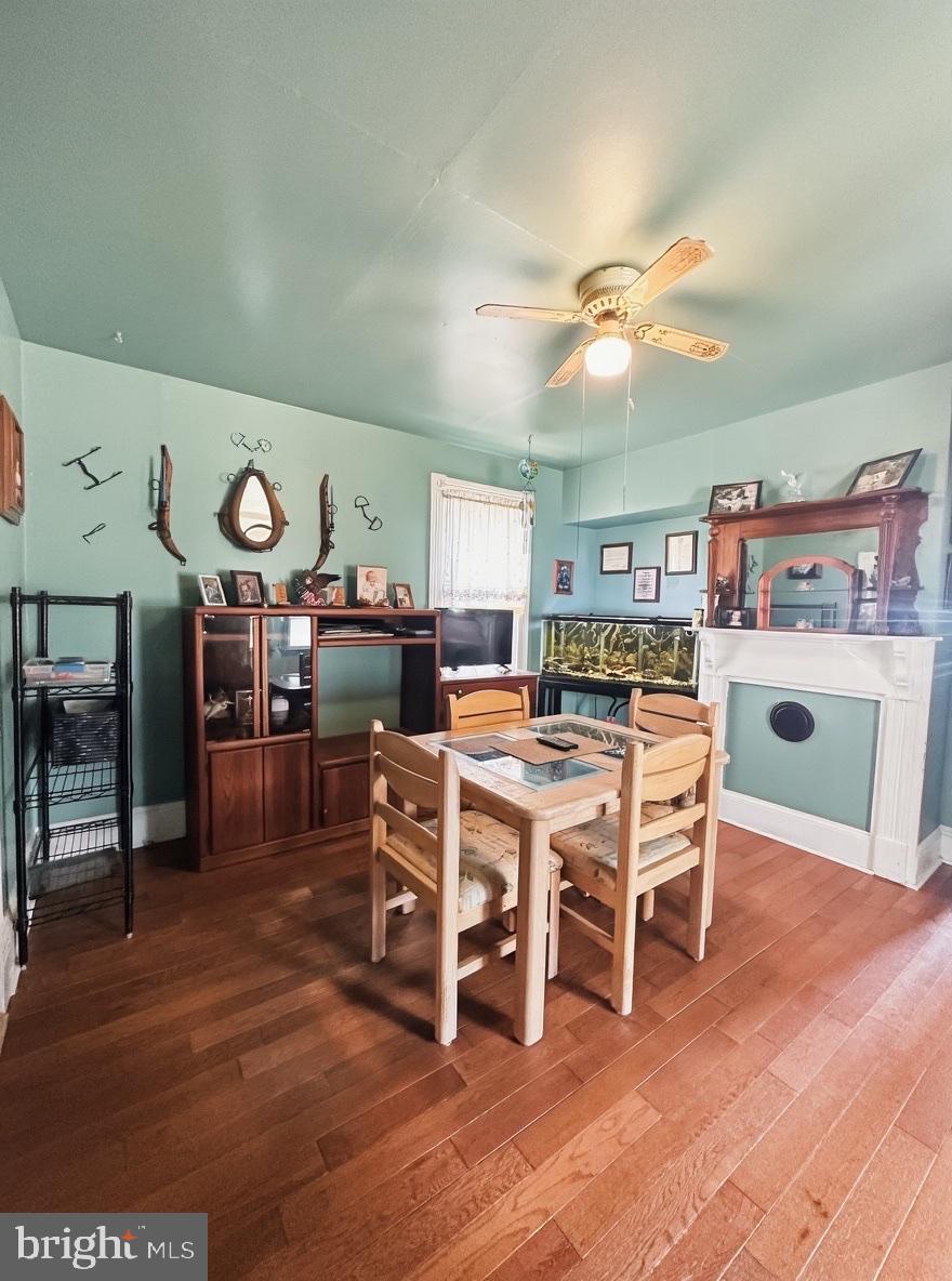 36 Martin Diggs Way Onemo, VA 23130 - Photo 15 of 64 a dining room with furniture a rug and wooden floor