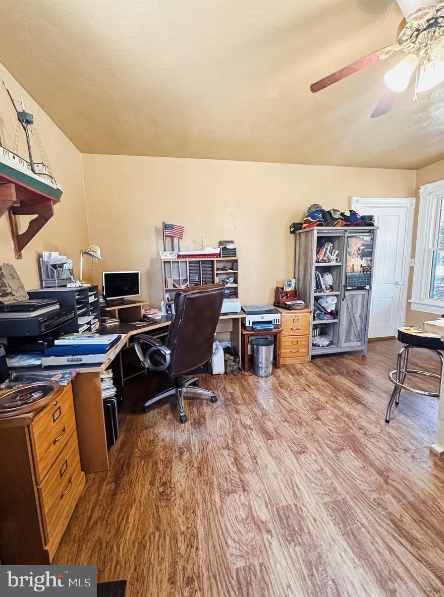 36 Martin Diggs Way Onemo, VA 23130 - Photo 24 of 64 a workspace with furniture and a wooden floor