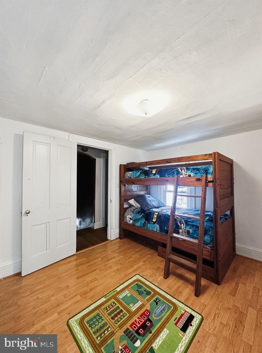 36 Martin Diggs Way Onemo, VA 23130 - Photo 33 of 64 a living room with furniture a flat screen tv and a rug