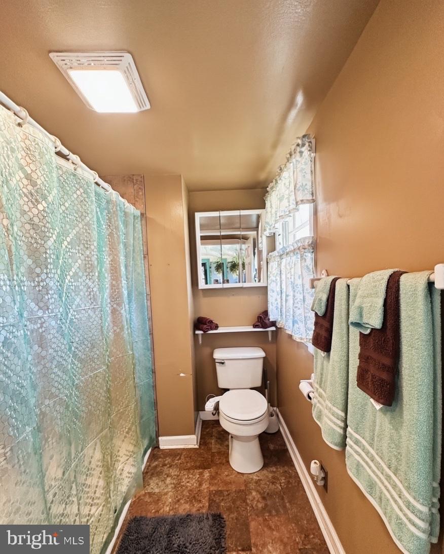 36 Martin Diggs Way Onemo, VA 23130 - Photo 4 of 64 a bathroom with a toilet sink and shower