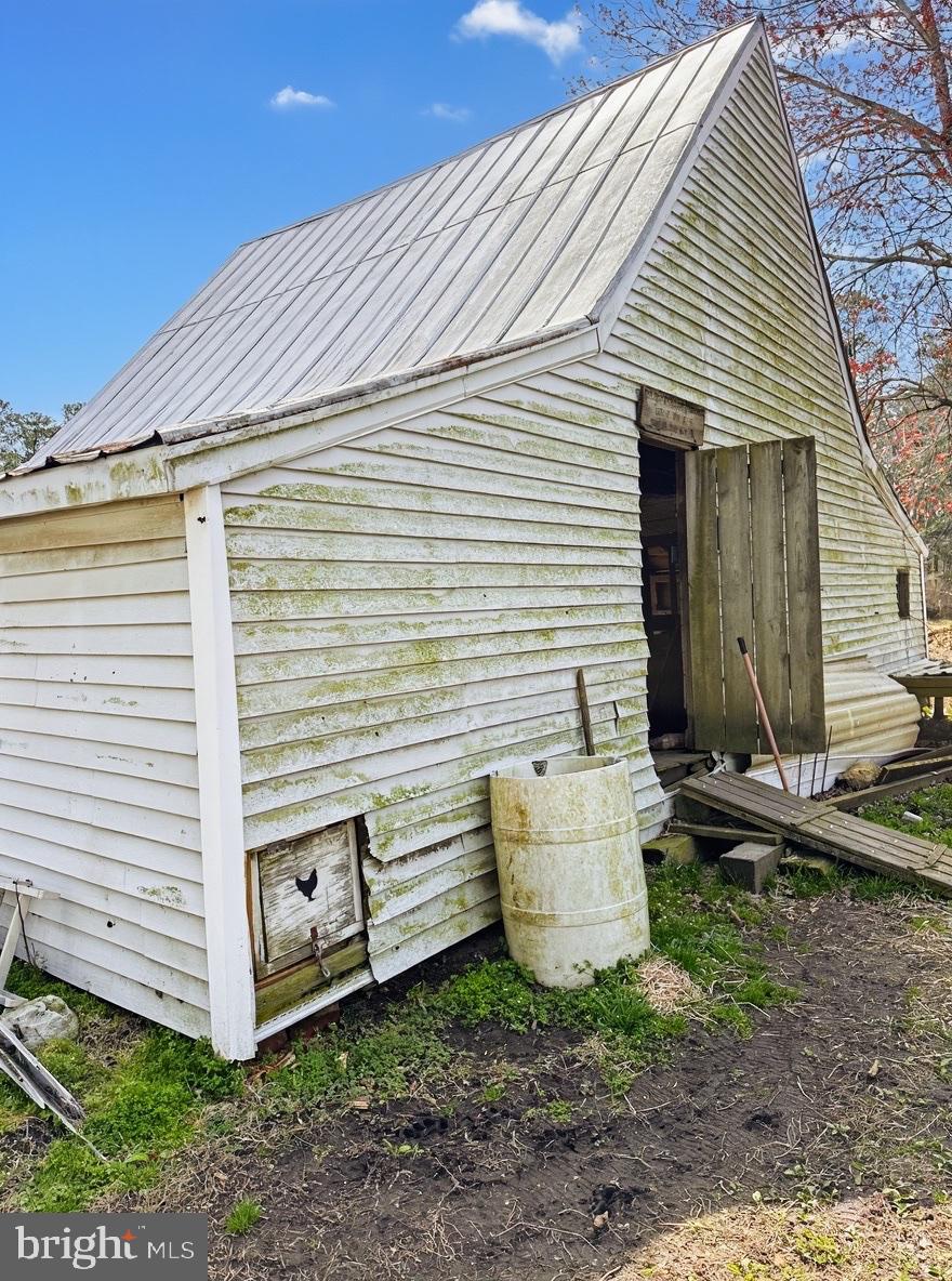 36 Martin Diggs Way Onemo, VA 23130 - Photo 44 of 64 a view of a small house with yard and furniture