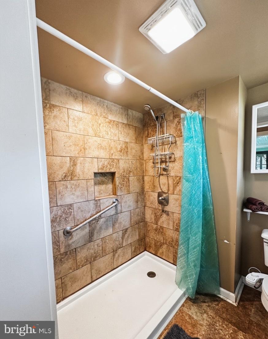 36 Martin Diggs Way Onemo, VA 23130 - Photo 5 of 64 a bathroom with a shower