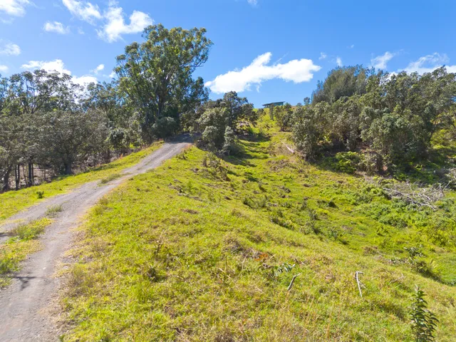 a view of an ocean and mountain