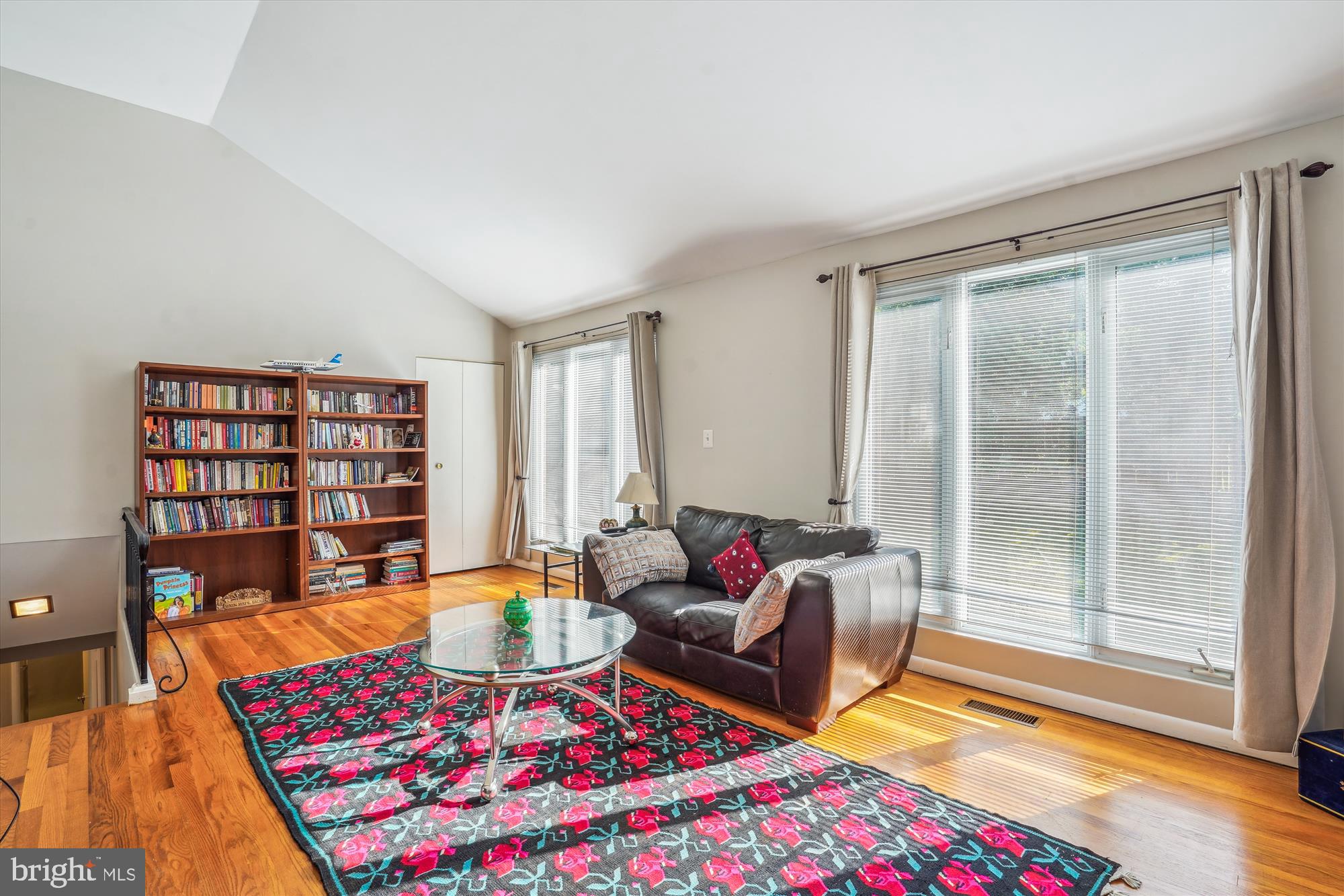 1803 Rupert Street McLean, VA 22101 - Photo 14 of 20 a living room with furniture and a floor to ceiling window