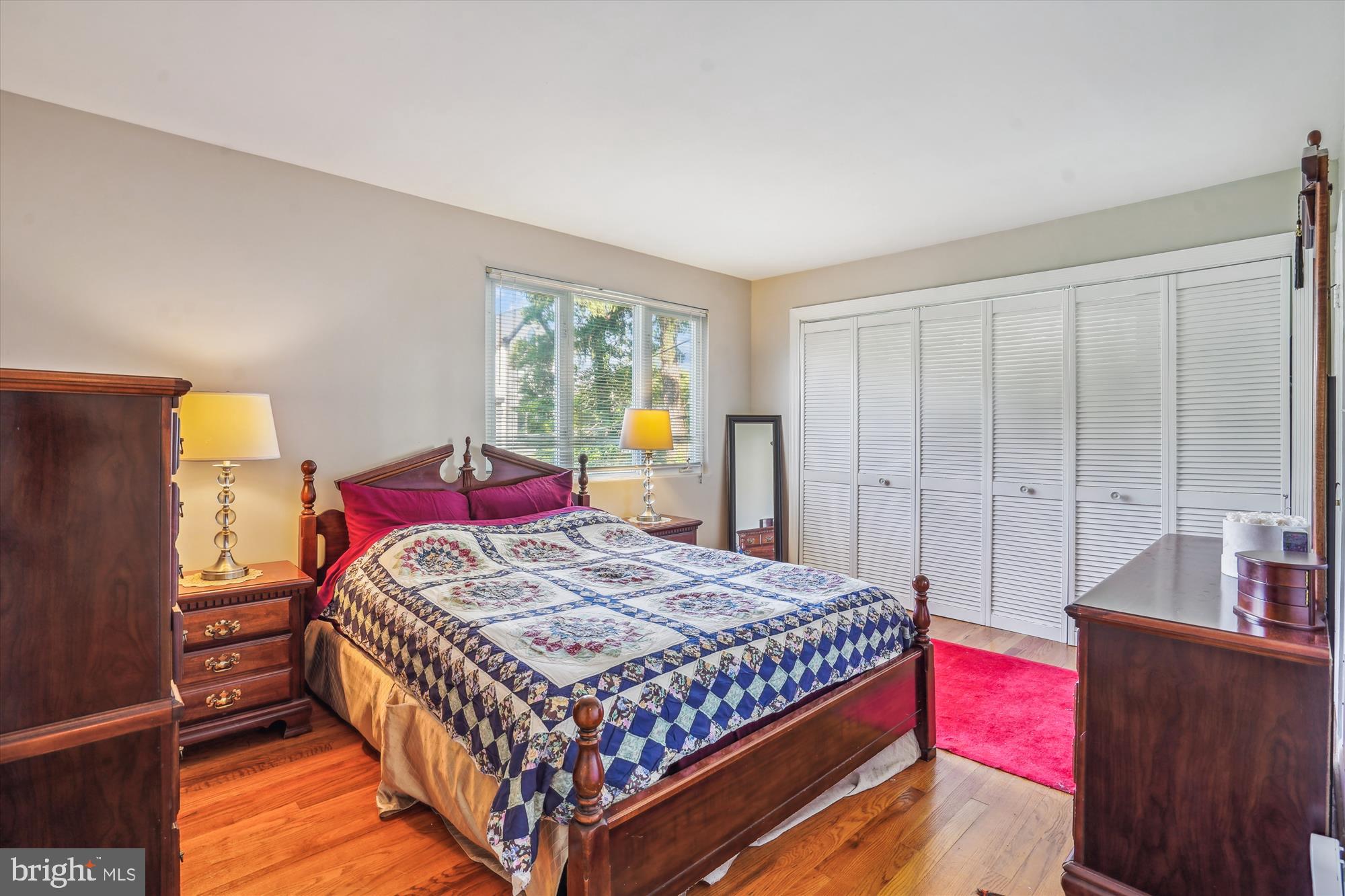 1803 Rupert Street McLean, VA 22101 - Photo 16 of 20 a bedroom with a bed wooden floor and window