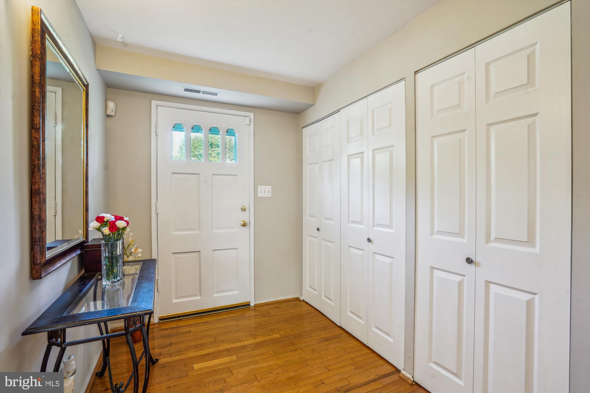1803 Rupert Street McLean, VA 22101 - Photo 3 of 20 a view of an entryway with wooden floor