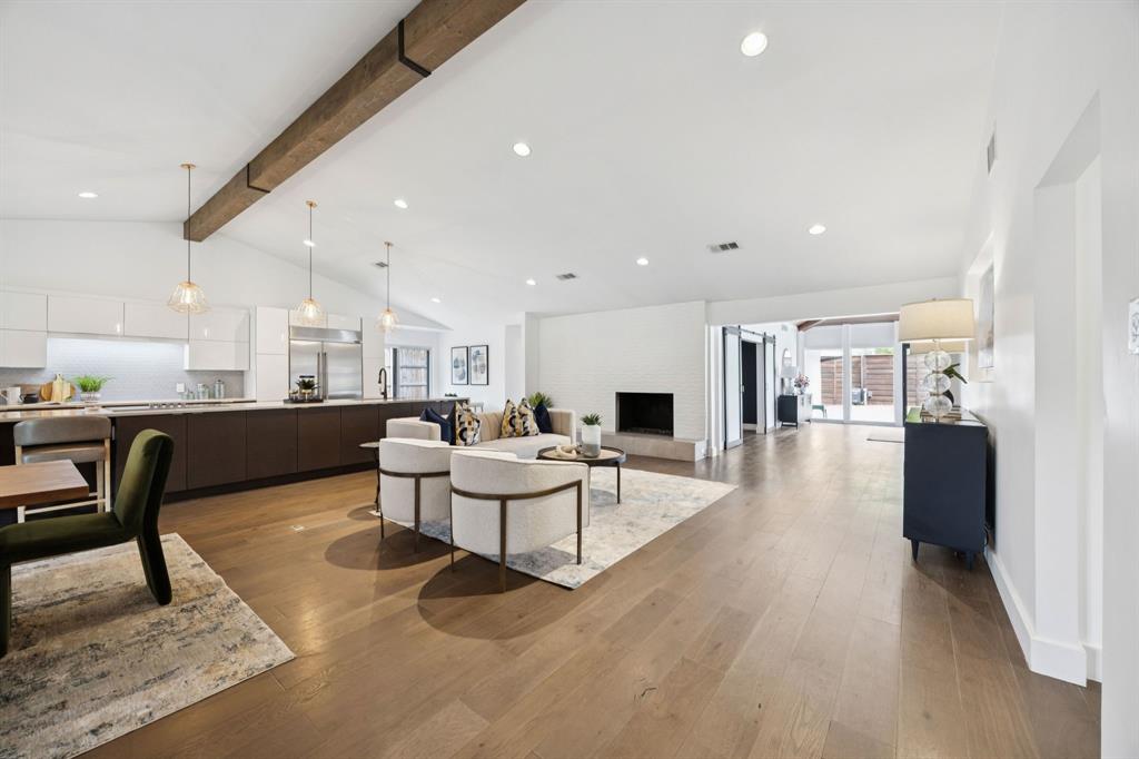 4925 Sugar Mill Road Dallas, TX 75244 - Photo 9 of 22 a living room with furniture and kitchen view