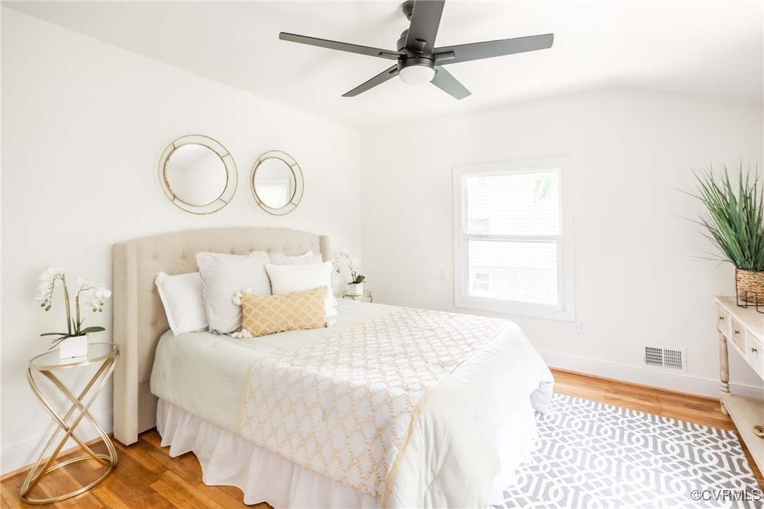 7111 Stoneman Road Henrico, VA 23228 - Photo 14 of 28 Bedroom featuring light wood-style floors, baseboa