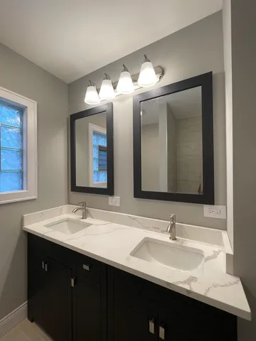 a bathroom with a tub and shower