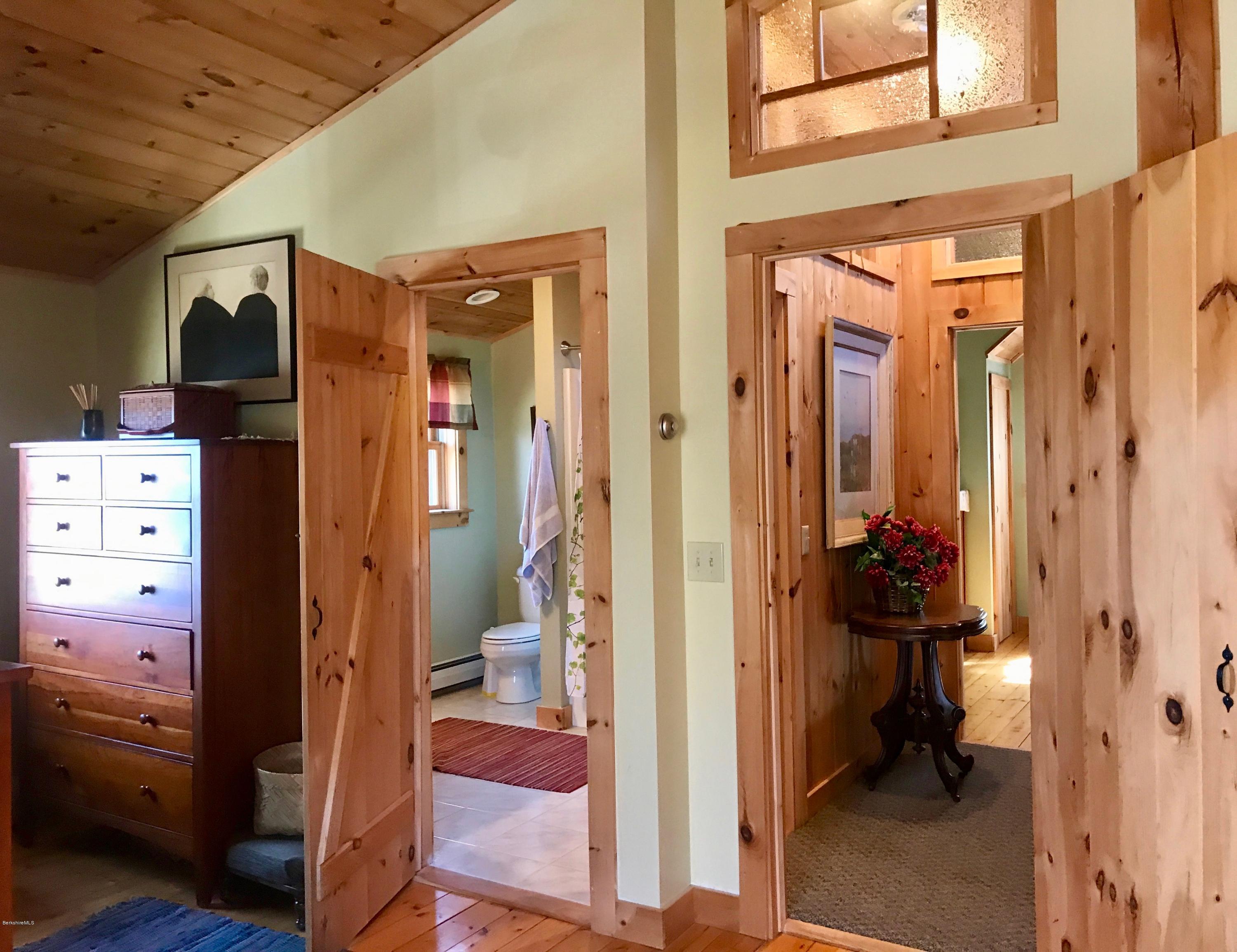 128 Branch Hill Road Heath, MA 01346 - Photo 13 of 30 a view of a hallway with a livingroom and a way to rooms