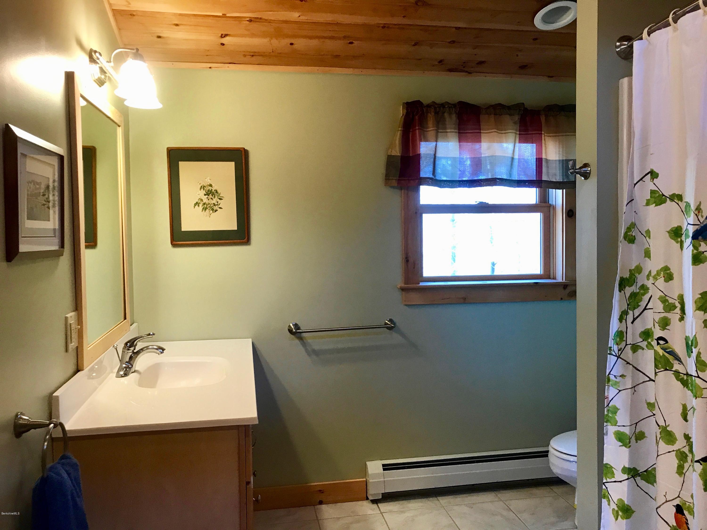 128 Branch Hill Road Heath, MA 01346 - Photo 14 of 30 a bathroom with a sink toilet and shower