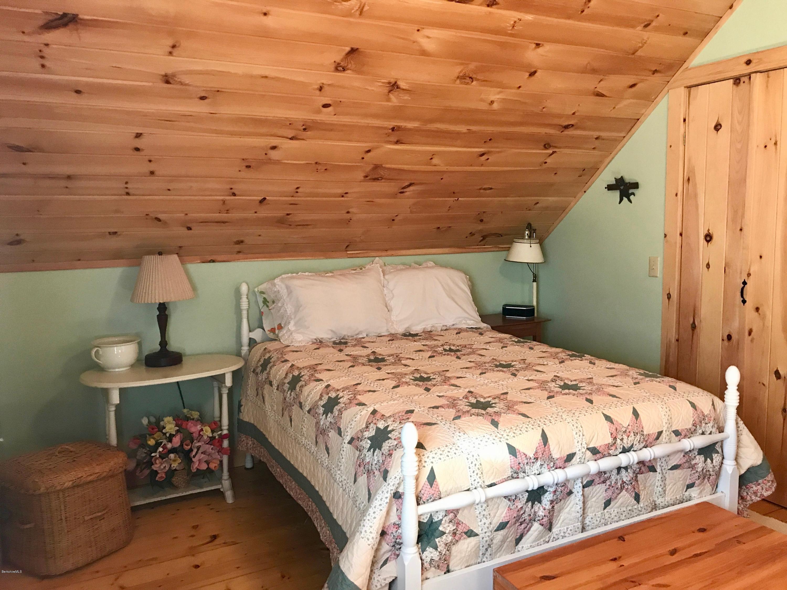 128 Branch Hill Road Heath, MA 01346 - Photo 15 of 30 a bedroom with a bed and a dresser