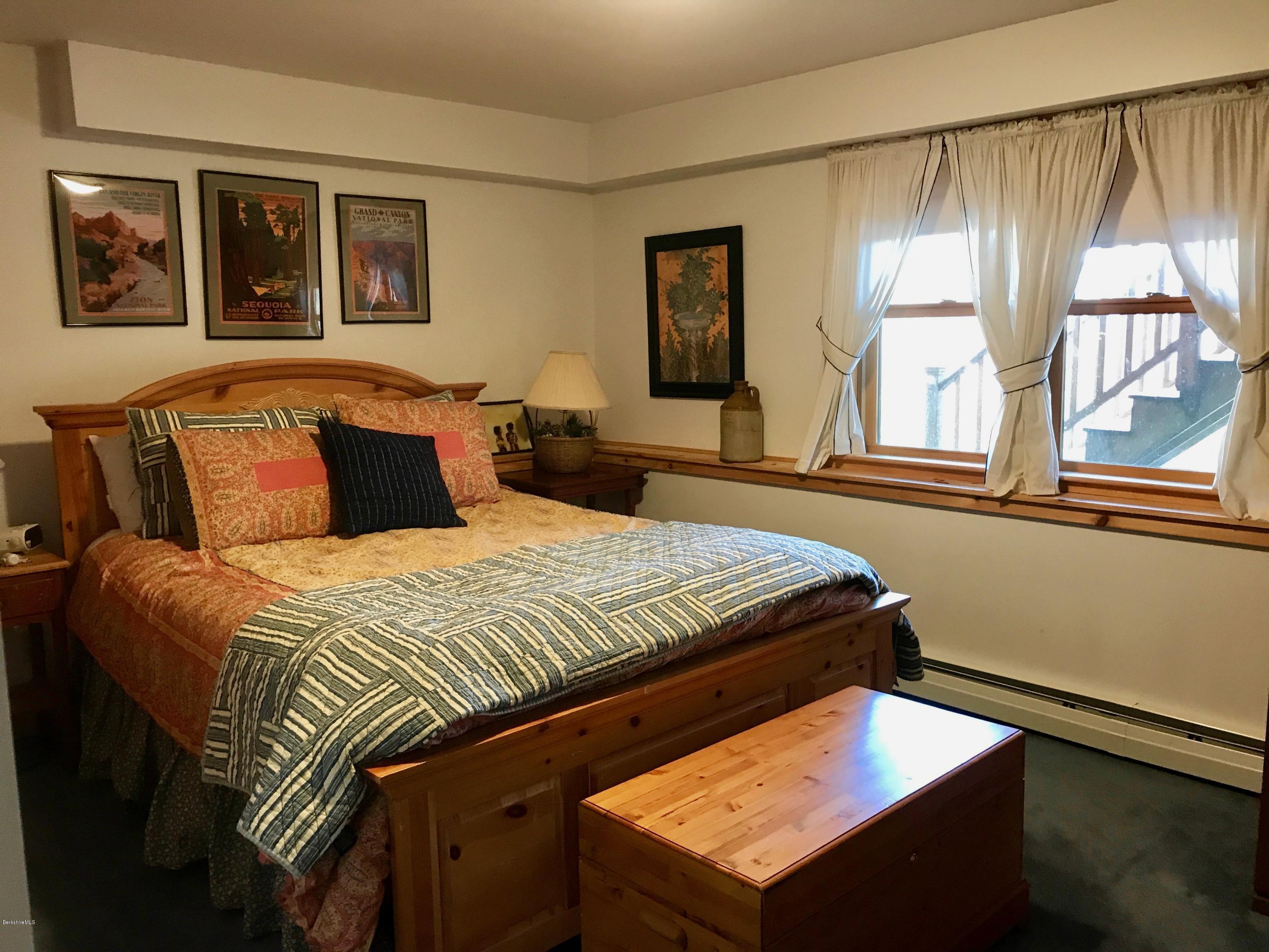 128 Branch Hill Road Heath, MA 01346 - Photo 18 of 30 a bedroom with a bed and a window
