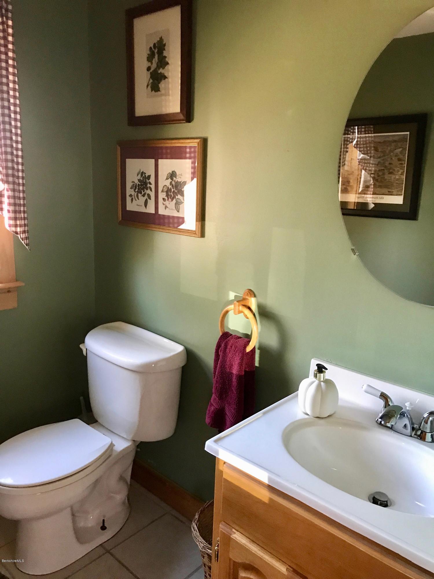 128 Branch Hill Road Heath, MA 01346 - Photo 23 of 30 a bathroom with a toilet and sink