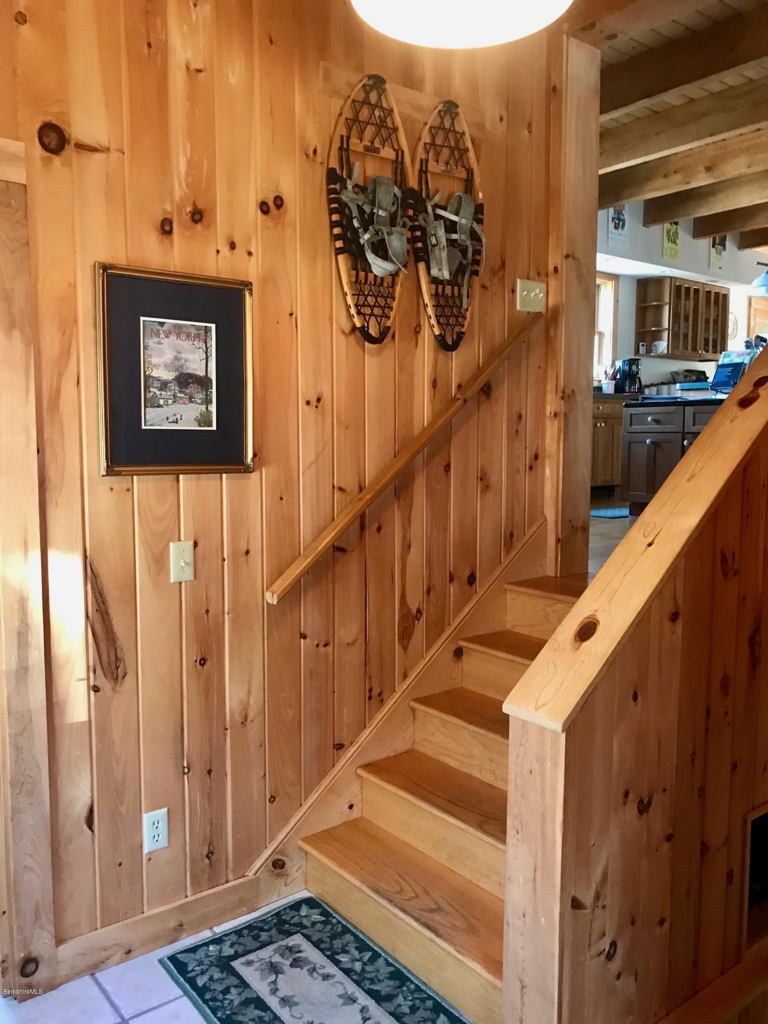 128 Branch Hill Road Heath, MA 01346 - Photo 24 of 30 a view of a hallway with wooden floor and stairs