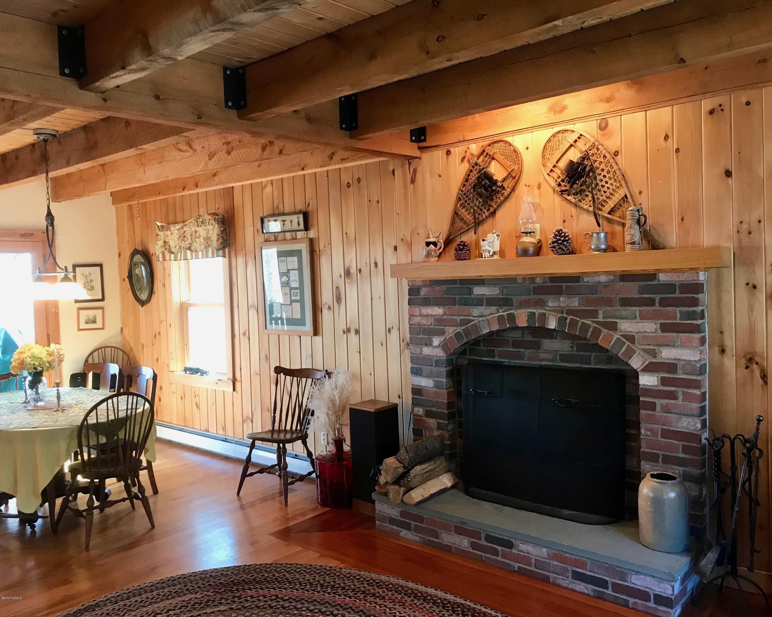 128 Branch Hill Road Heath, MA 01346 - Photo 10 of 30 a living room with furniture and a fireplace