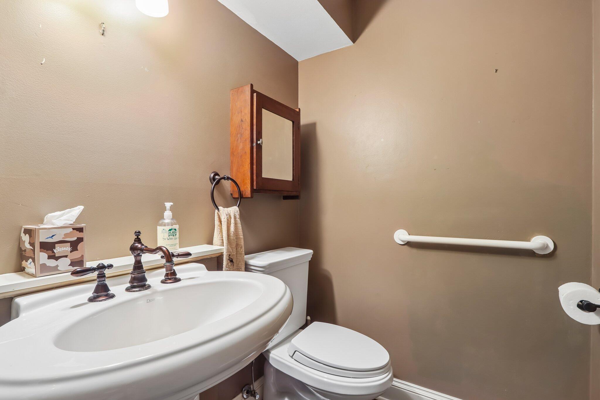 7400 North Pierron Road Glendale, WI 53209 - Photo 17 of 49 main level half bath