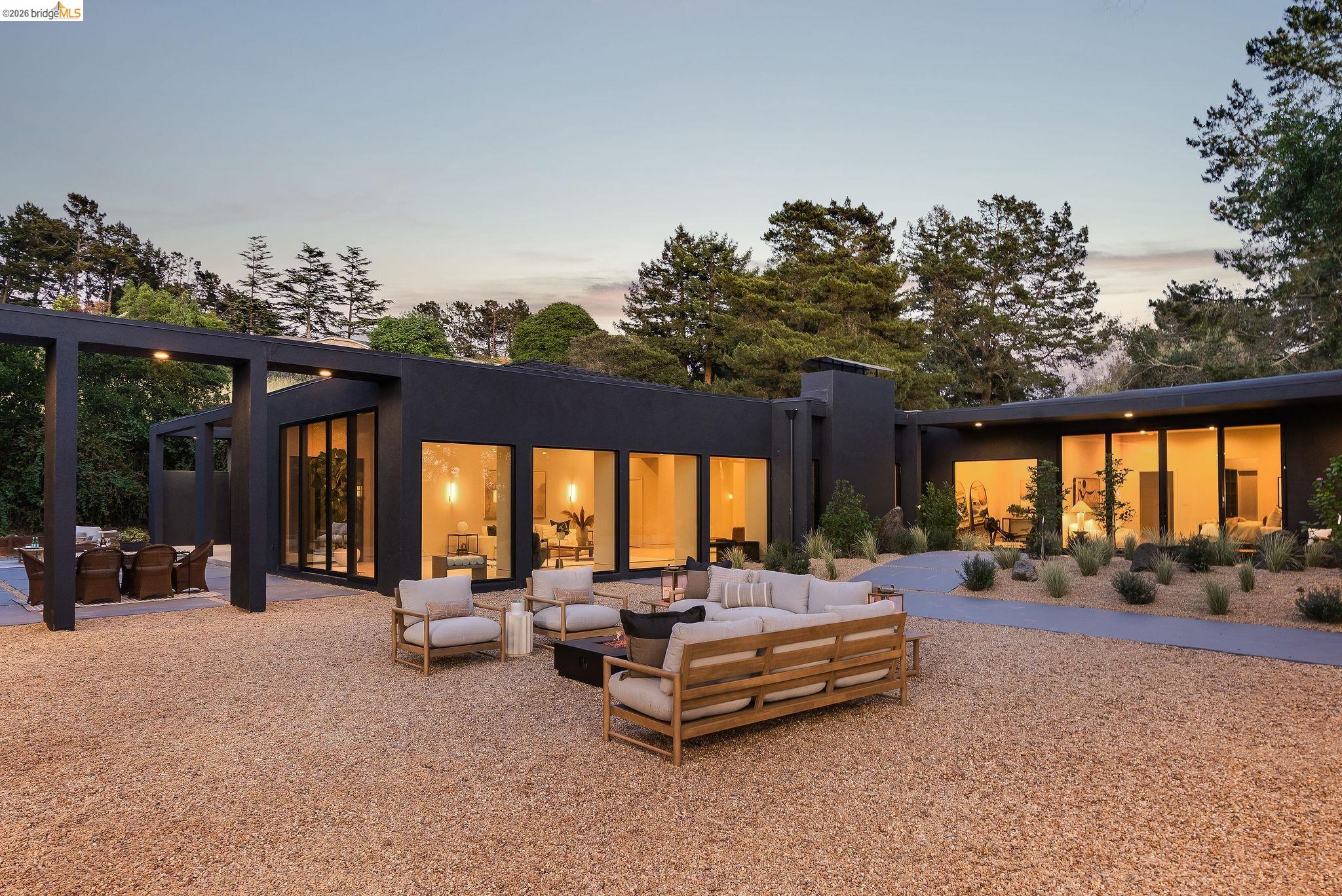 5645 Bacon Road Oakland, CA 94619 - Photo 90 of 94 Modern exterior with dark-toned siding and extensive glass panels
