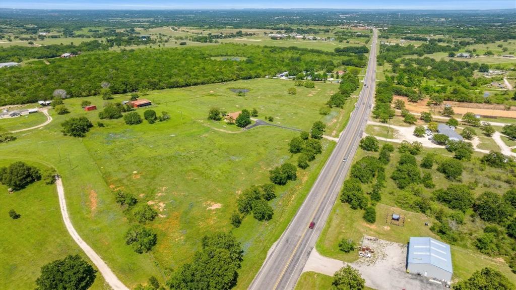 17305 Highway 281 Hico, TX 76457 - Photo 24 of 28 an aerial view of swimming pool with a yard