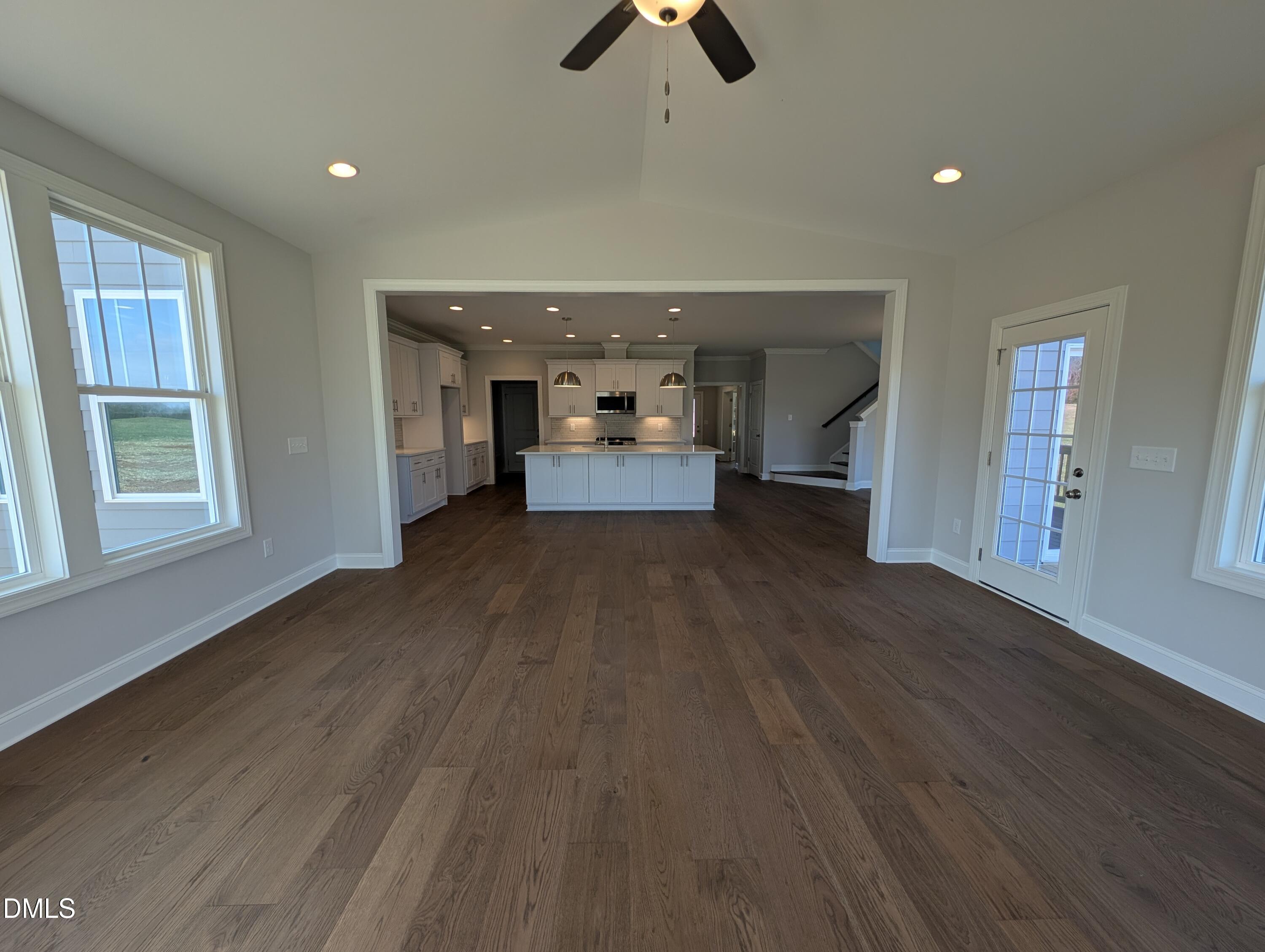 2818 John Lewis Road Burlington, NC 27217 - Photo 12 of 62 wooden floor in an empty room with a window