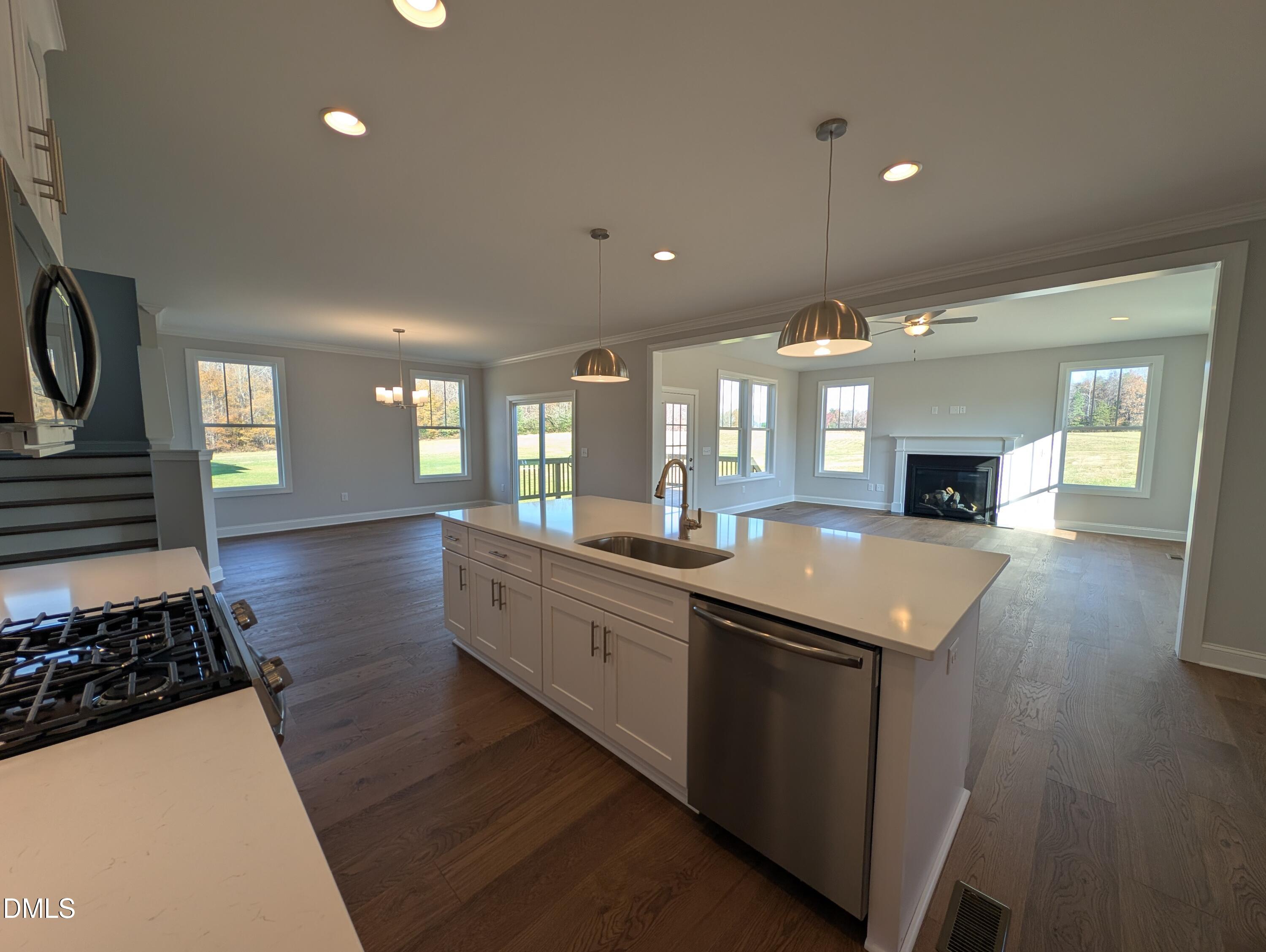 2818 John Lewis Road Burlington, NC 27217 - Photo 20 of 62 a kitchen with stainless steel appliances granite countertop a stove and a refrigerator