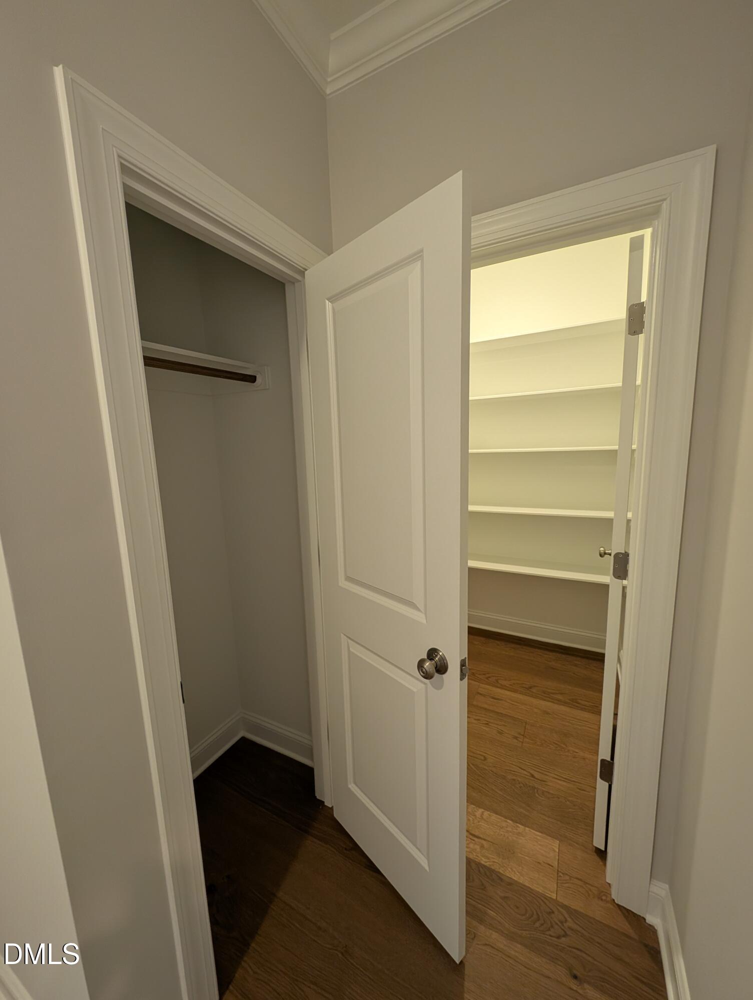 2818 John Lewis Road Burlington, NC 27217 - Photo 24 of 62 a view of walk in closet with empty racks