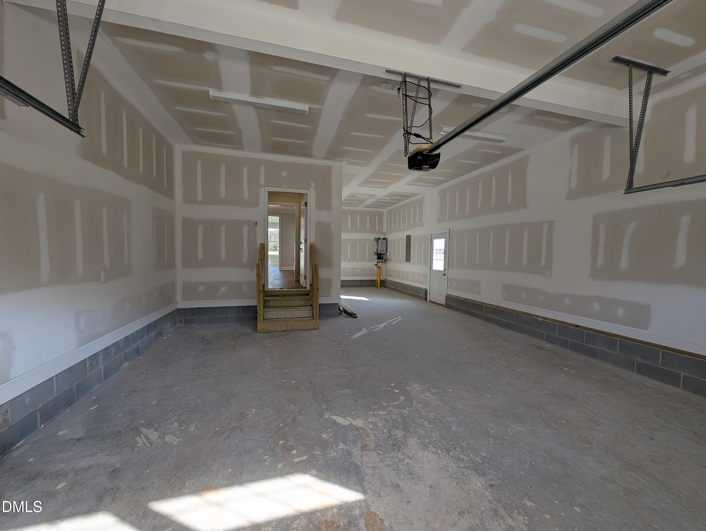 2818 John Lewis Road Burlington, NC 27217 - Photo 25 of 62 a view of empty room with stairs