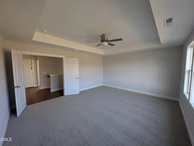 a large bathroom with a double vanity sink and a mirror