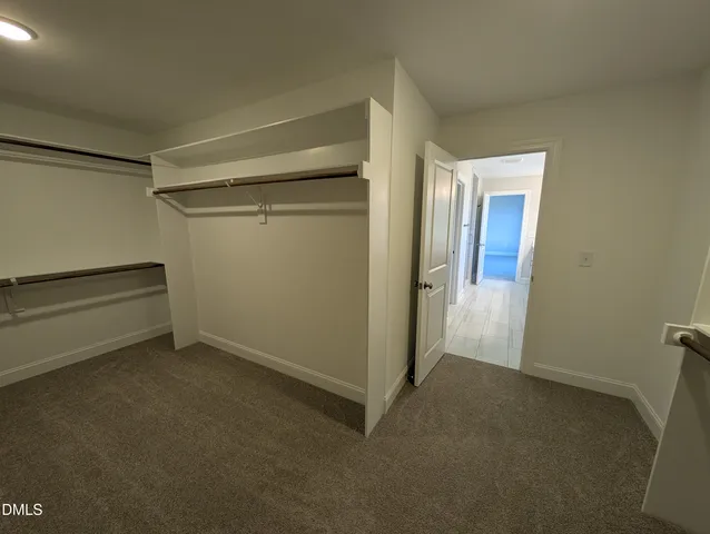 a bathroom with a bathtub and a toilet