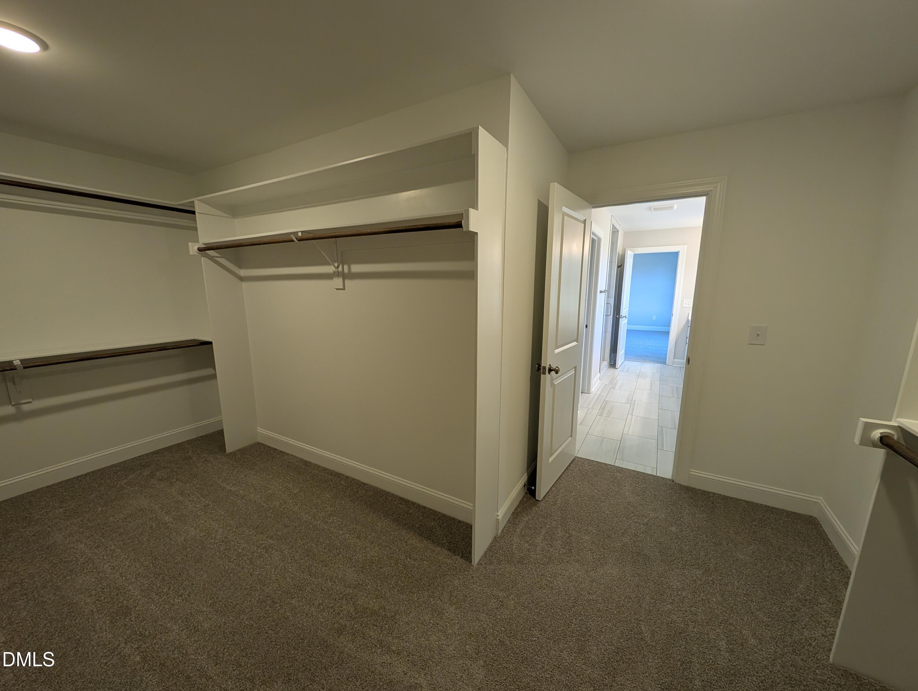 2818 John Lewis Road Burlington, NC 27217 - Photo 38 of 62 a view of room with walk in closet