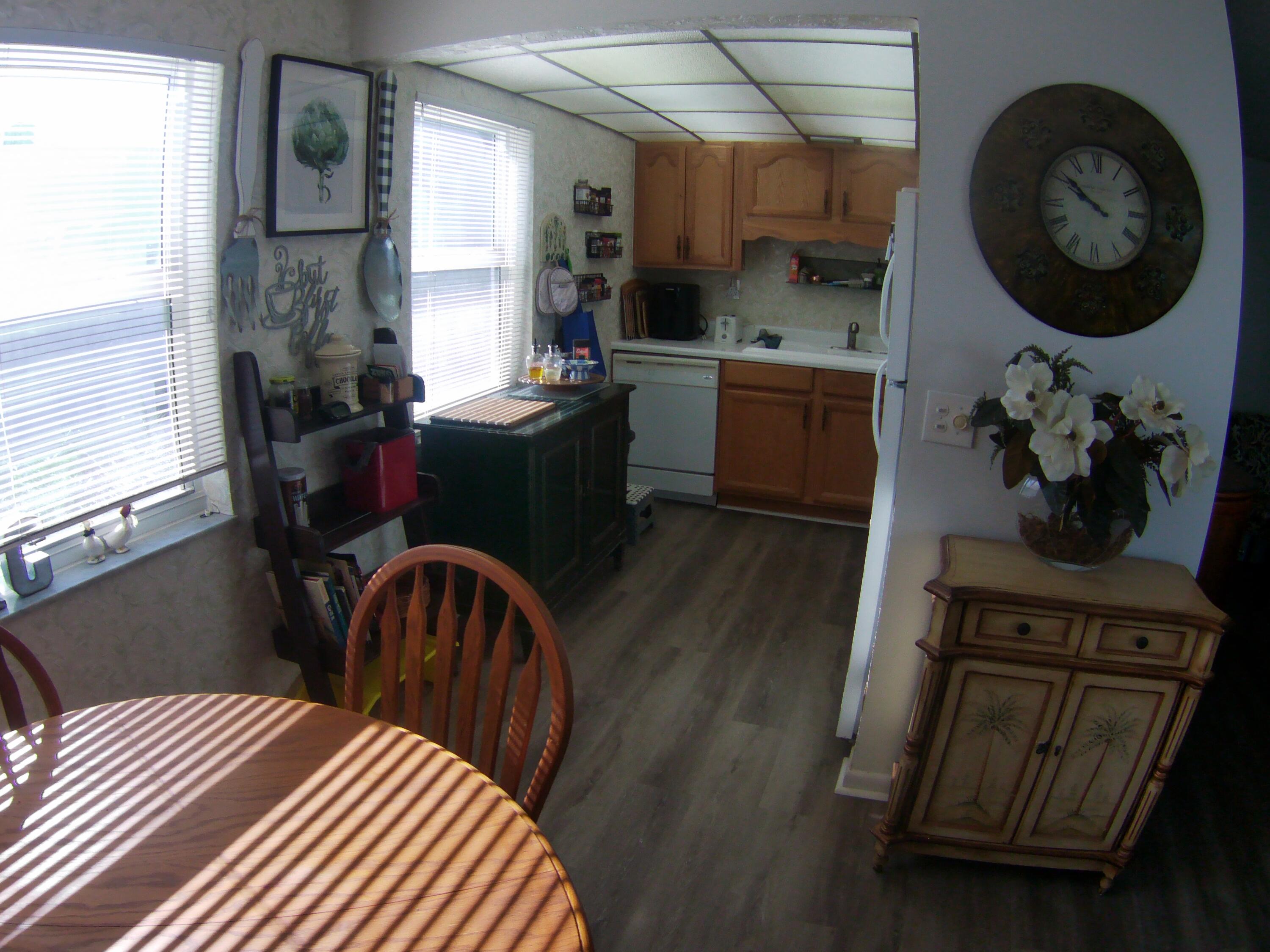 571 Capri L Delray Beach, FL 33484 - Photo 11 of 33 a kitchen with sink and cabinets