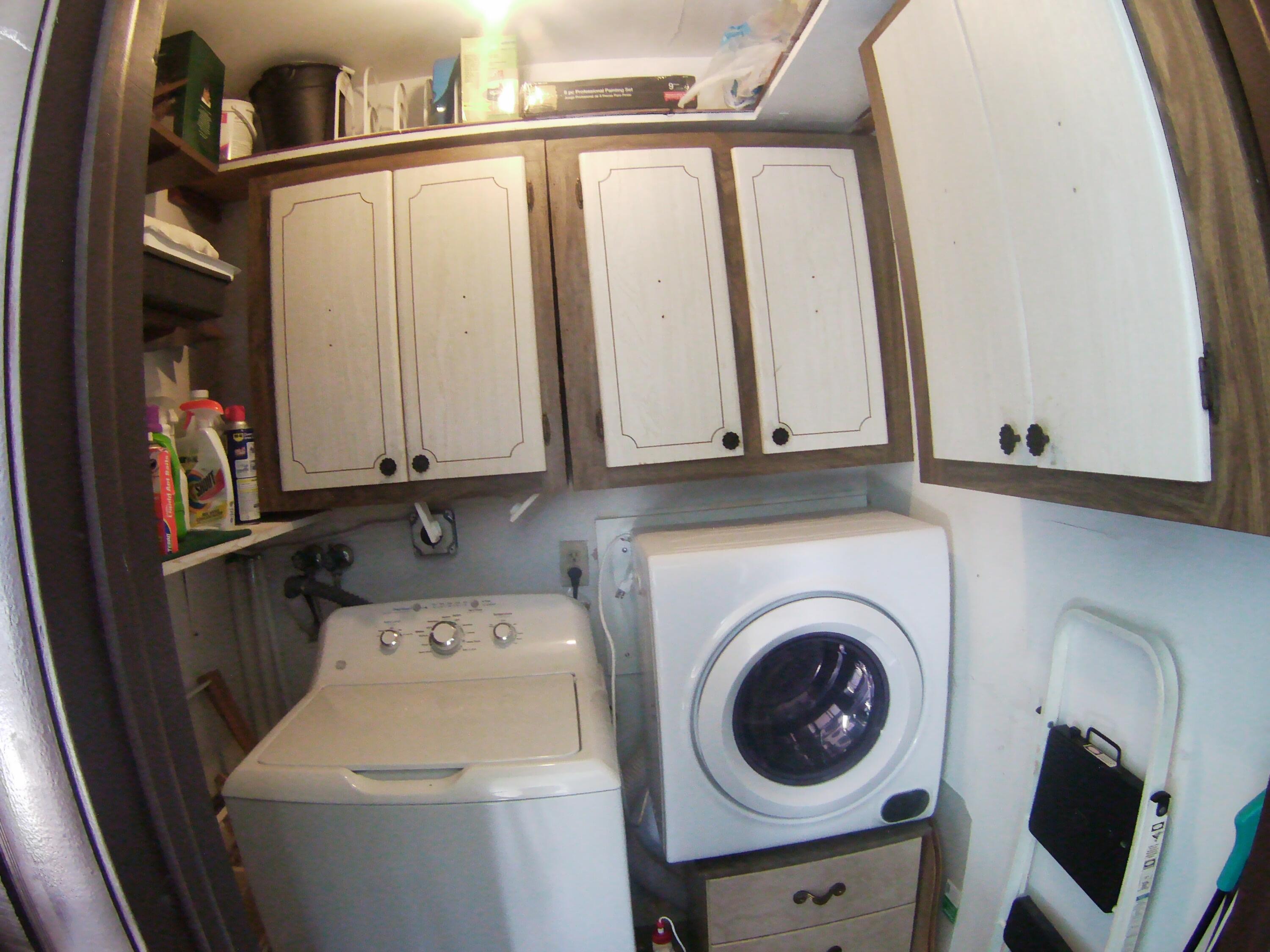 571 Capri L Delray Beach, FL 33484 - Photo 32 of 33 a utility room with dryer and washer