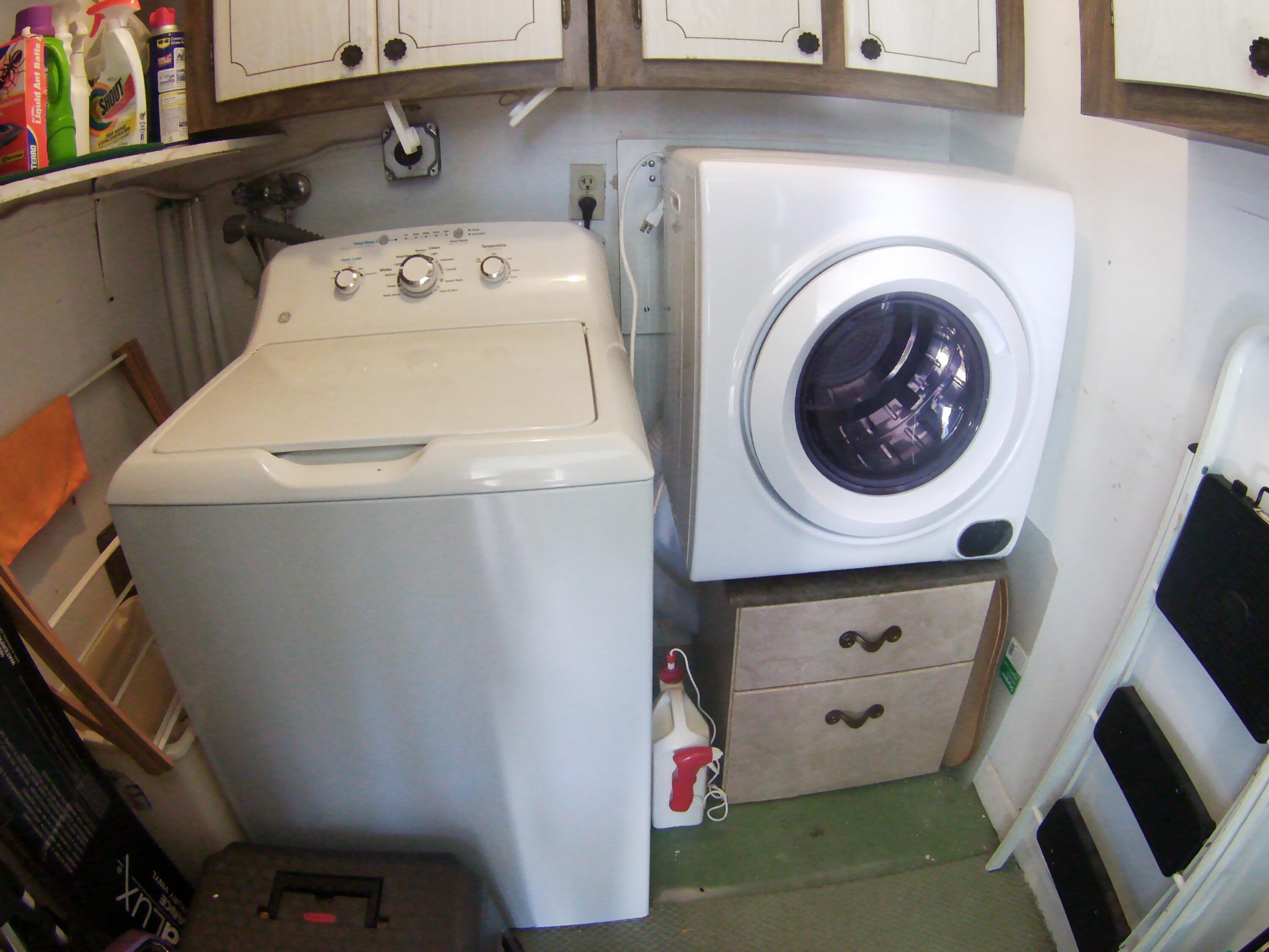571 Capri L Delray Beach, FL 33484 - Photo 33 of 33 a utility room with dryer and washer