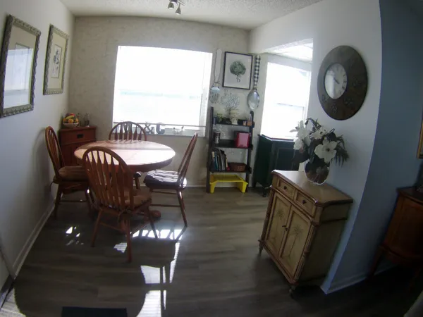 a view of balcony with furniture