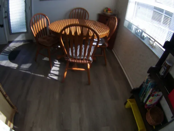 a kitchen with sink and cabinets
