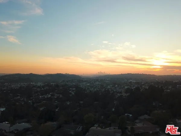 an aerial view of residential house and outdoor space