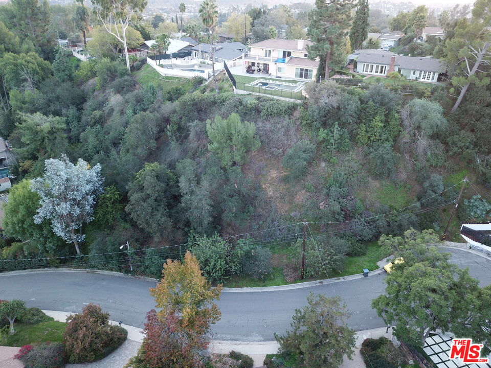1450 Marianna Road Pasadena, CA 91105 - Photo 7 of 13 a view of a street with a yard
