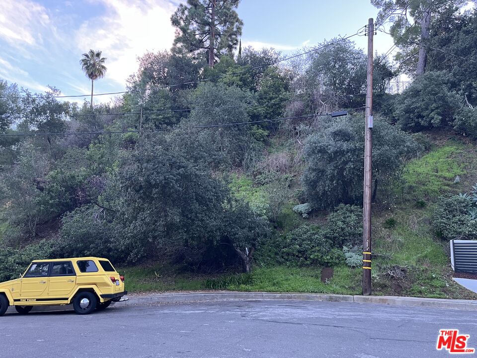 1450 Marianna Road Pasadena, CA 91105 - Photo 8 of 13 a car parked on the side of the road