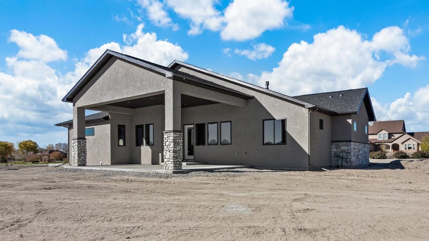 1193 22 1/2 Road Grand Junction, CO 81505 - Photo 26 of 28 a view of a house with a yard