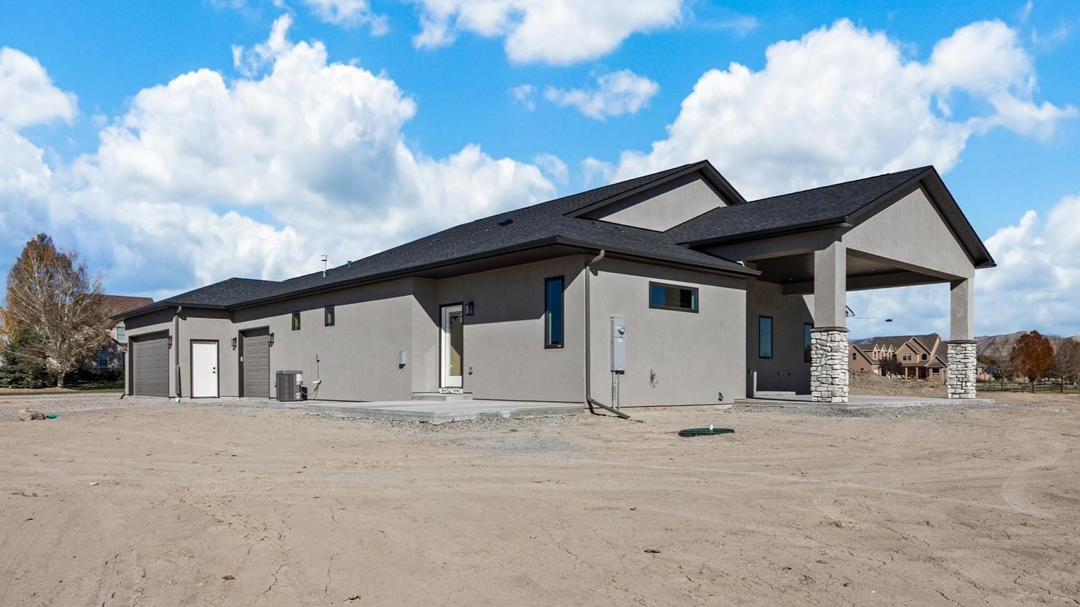 1193 22 1/2 Road Grand Junction, CO 81505 - Photo 27 of 28 a view of house with garage