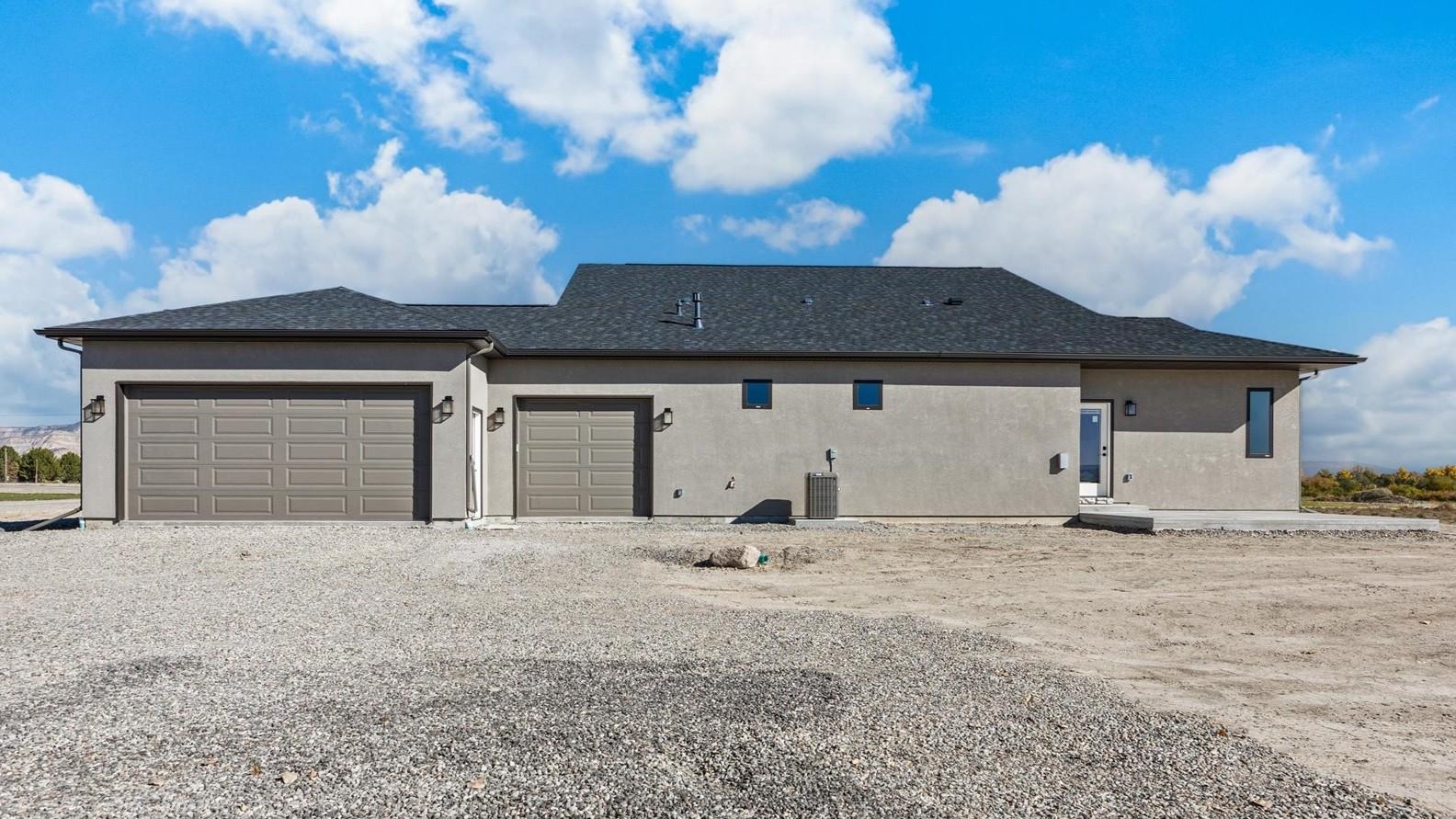 1193 22 1/2 Road Grand Junction, CO 81505 - Photo 28 of 28 a front view of a house with a yard